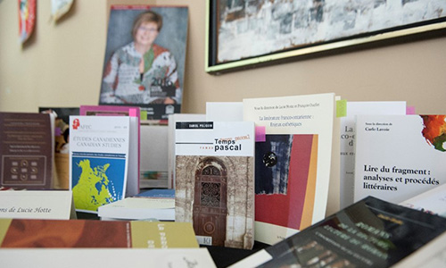Various books on a desk.
