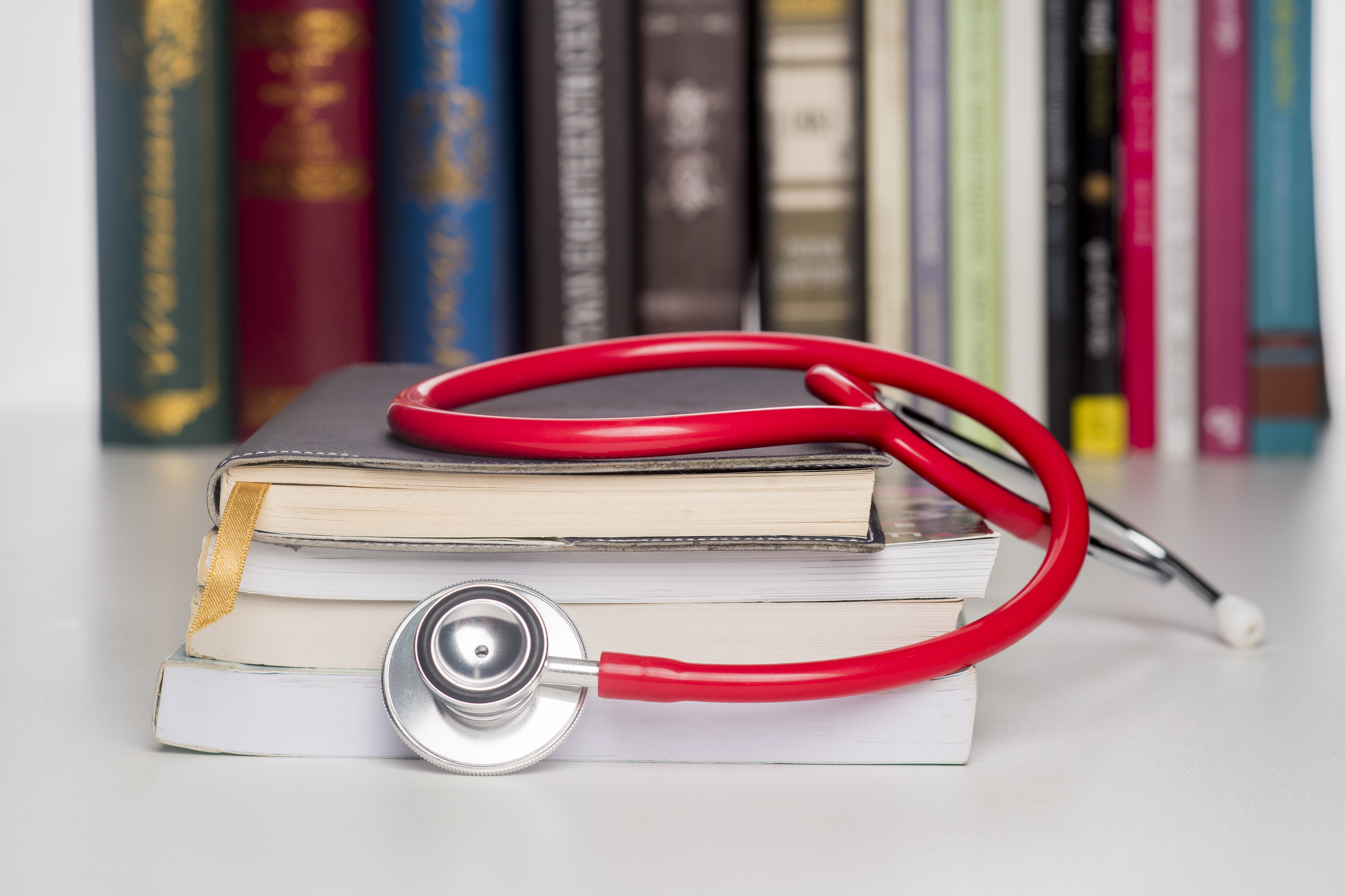 medical education with book and stethoscope