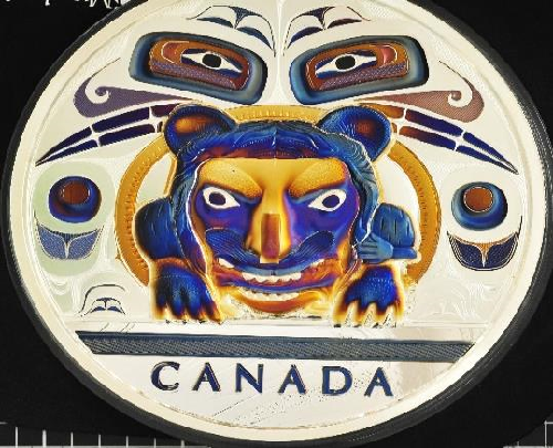	Texte de remplacement : Un cercle avec un tigre et des yeux colorés et une inscription « CANADA » en dessous.