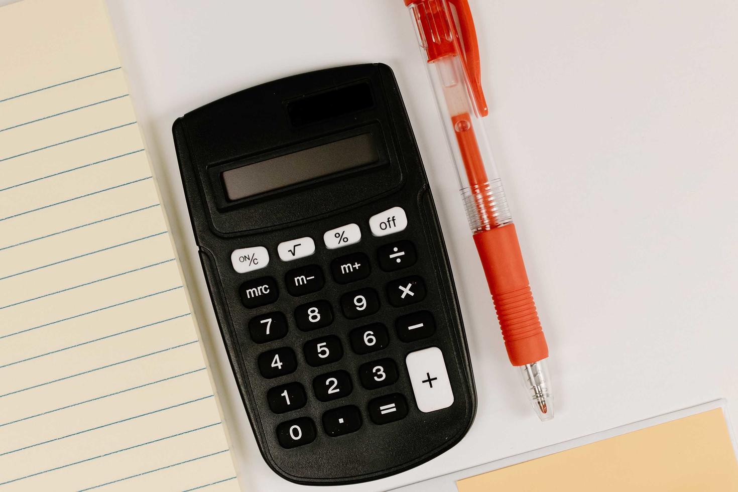 A calculator and a pen